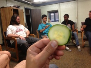 Students gather as a simple church in a dorm at Cornell. Here, they celebrate communion during worship with a cucumber. That's another story (but a good one).